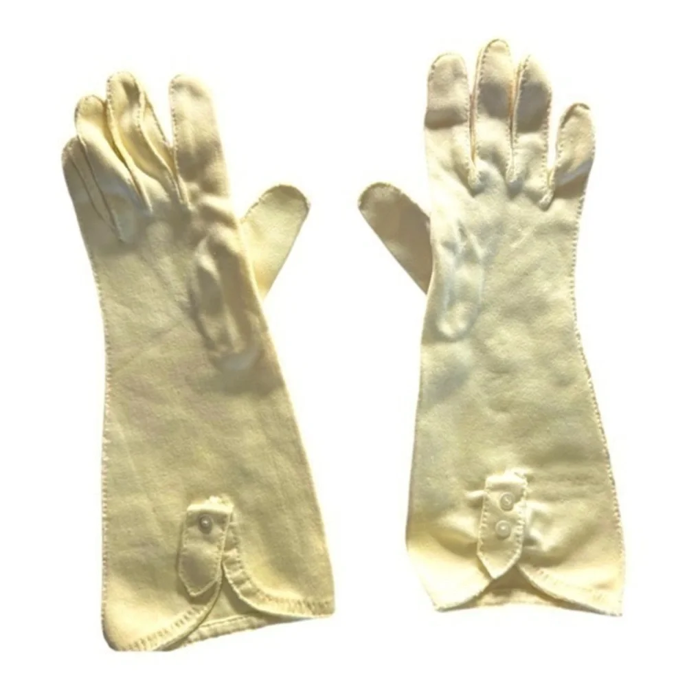 Vintage cream colored gloves.